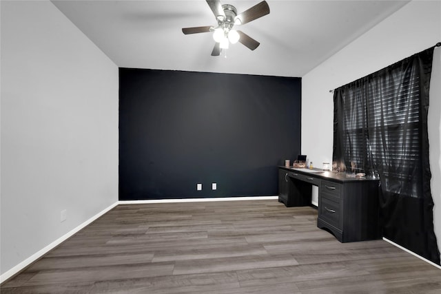 8835 Willet St, Baytown, TX 77521 - unfurnished office featuring a ceiling fan, wood finished floors, and baseboards