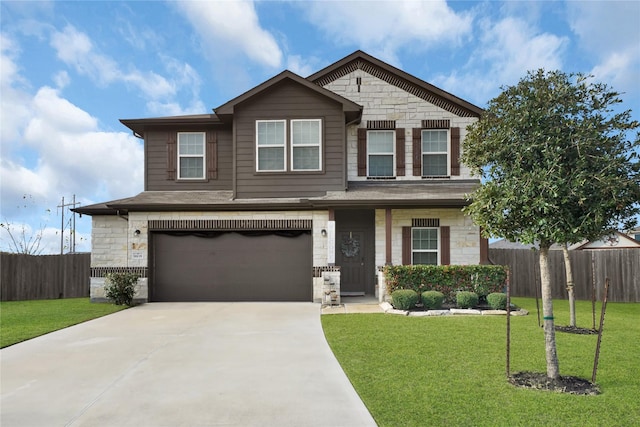 8835 Willet St, Baytown, TX 77521 - view of front of home with stone siding, an attached garage, and concrete driveway