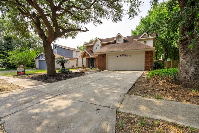 15034 Elstree Dr, Channelview, TX 77530 - traditional-style home with brick siding, an attached garage, concrete driveway, and a shingled roof