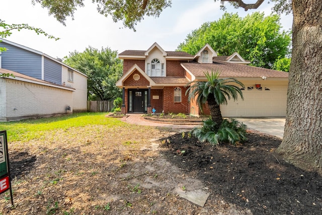 15034 Elstree Dr, Channelview, TX 77530 - view of front of home with brick siding, a garage, concrete driveway, and roof with shingles
