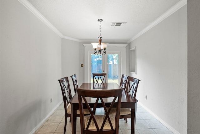 15034 Elstree Dr, Channelview, TX 77530 - dining room featuring light tile patterned floors, a chandelier, crown molding, and baseboards