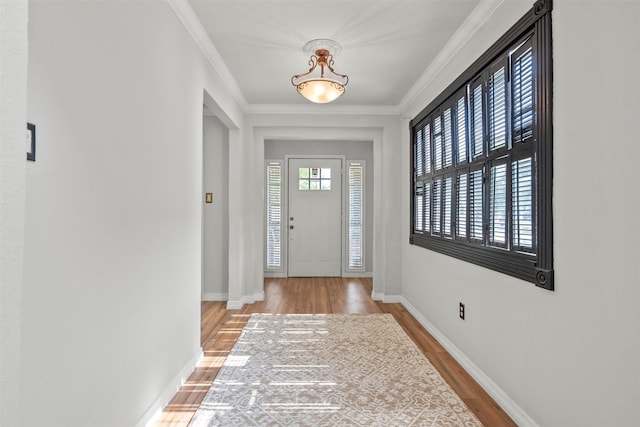 15034 Elstree Dr, Channelview, TX 77530 - foyer featuring wood finished floors, baseboards, and crown molding