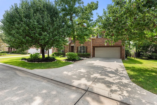 95 W Hullwood Cir, The Woodlands, TX 77389 - view of property hidden behind natural elements with brick siding, driveway, a front yard, and an attached garage
