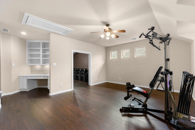 95 W Hullwood Cir, The Woodlands, TX 77389 - workout area featuring attic access, a ceiling fan, dark wood-style floors, and baseboards