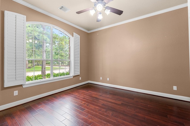 95 W Hullwood Cir, The Woodlands, TX 77389 - unfurnished room featuring healthy amount of natural light, dark wood-style flooring, baseboards, a ceiling fan, and ornamental molding