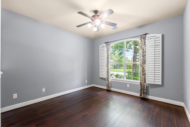 95 W Hullwood Cir, The Woodlands, TX 77389 - unfurnished room with baseboards, a ceiling fan, and wood finished floors