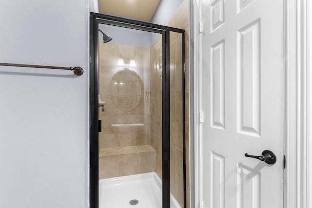 95 W Hullwood Cir, The Woodlands, TX 77389 - bathroom featuring a shower stall