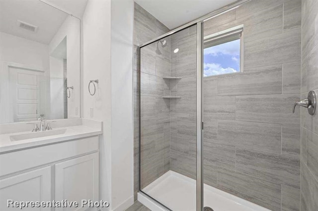 27007 Golden Isle Ln, Katy, TX 77493 - bathroom with a shower stall and vanity