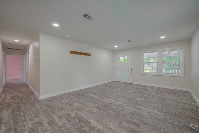 8302 Magna St, Houston, TX 77093 - entryway with recessed lighting, wood finished floors, and baseboards