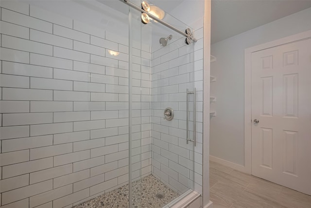 8302 Magna St, Houston, TX 77093 - bathroom with a stall shower and baseboards