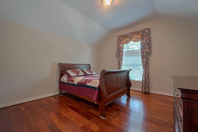 4707 Gladesdale Park Ln, Katy, TX 77450 - bedroom with dark wood finished floors, lofted ceiling, and baseboards