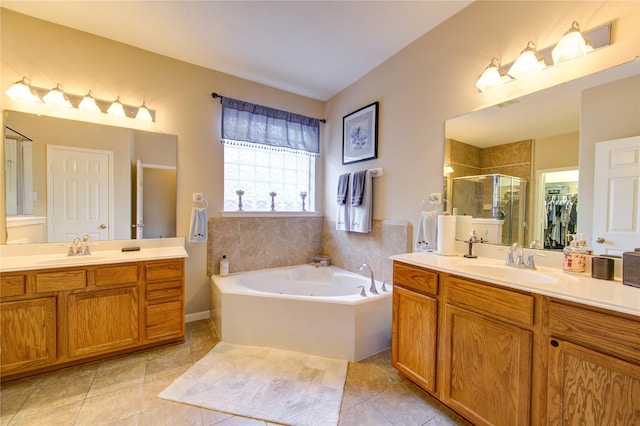 21714 Honeysuckle Grove Ln, Richmond, TX 77469 - full bathroom featuring a shower stall, a garden tub, tile patterned flooring, and two vanities