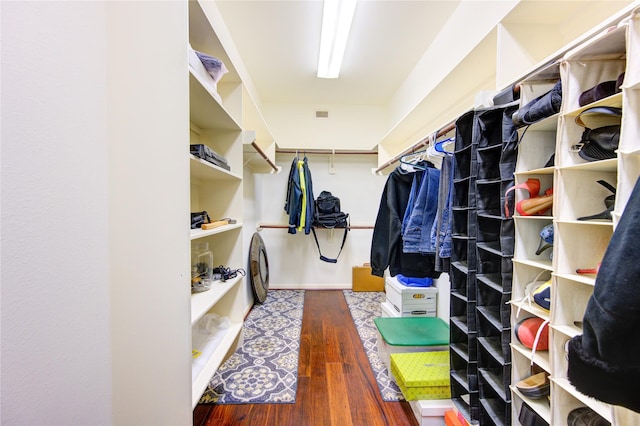 21714 Honeysuckle Grove Ln, Richmond, TX 77469 - walk in closet with hardwood / wood-style floors