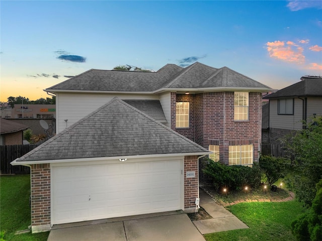 14531 County Cress Dr, Houston, TX 77047 - view of front of house featuring brick siding, a shingled roof, concrete driveway, and an attached garage