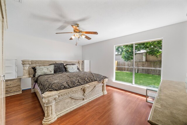 14531 County Cress Dr, Houston, TX 77047 - bedroom featuring wood finished floors and ceiling fan
