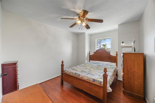 14531 County Cress Dr, Houston, TX 77047 - bedroom with wood finished floors and a ceiling fan