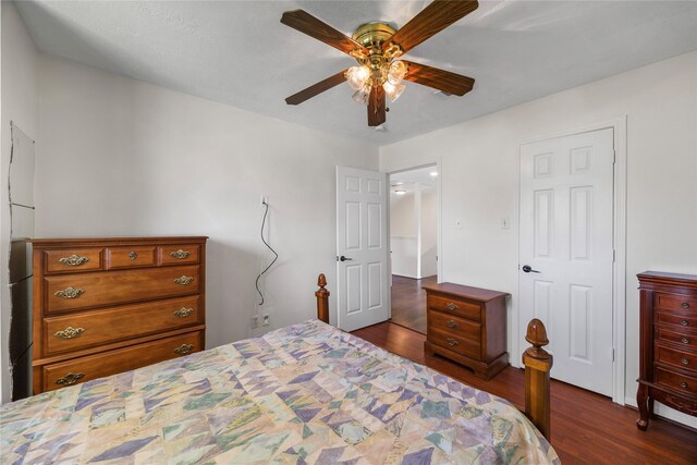 14531 County Cress Dr, Houston, TX 77047 - bedroom featuring dark wood-type flooring and a ceiling fan