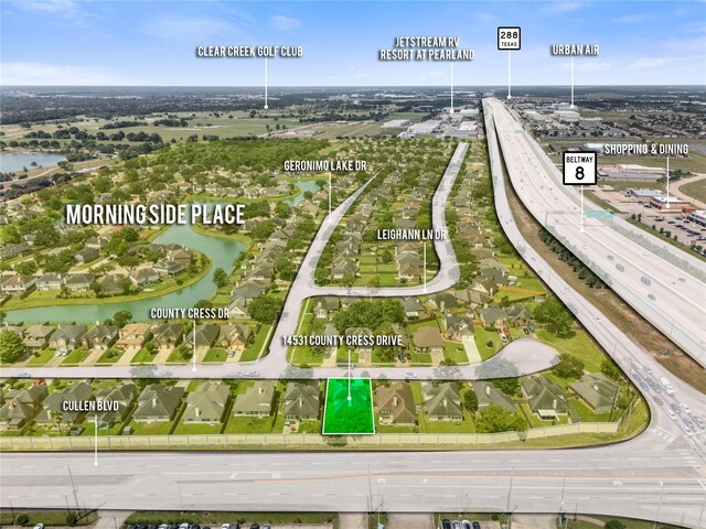 14531 County Cress Dr, Houston, TX 77047 - aerial view of residential area featuring a highway, a large body of water, and property parcel outlined