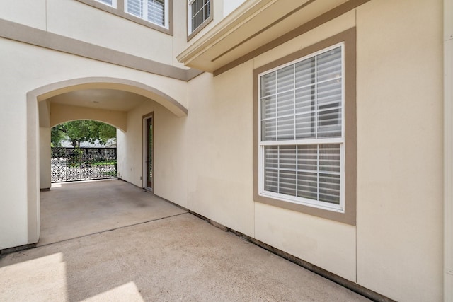 4021 Glenshire St, Houston, TX 77025 - property entrance with stucco siding and a patio area