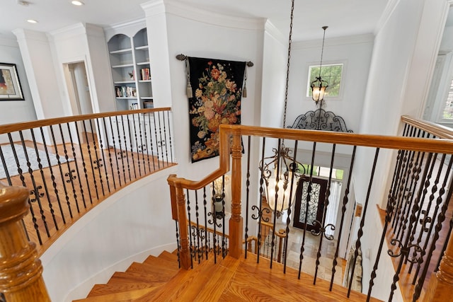 4021 Glenshire St, Houston, TX 77025 - staircase featuring a chandelier, ornamental molding, and recessed lighting