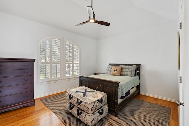 4021 Glenshire St, Houston, TX 77025 - bedroom with wood finished floors, lofted ceiling, ceiling fan, and baseboards