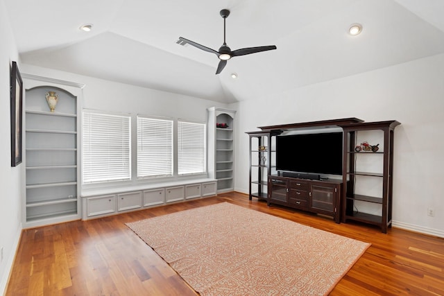 4021 Glenshire St, Houston, TX 77025 - living area with vaulted ceiling, a ceiling fan, wood finished floors, baseboards, and recessed lighting
