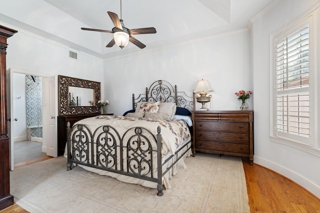 4021 Glenshire St, Houston, TX 77025 - bedroom with wood finished floors, baseboards, ornamental molding, and a ceiling fan