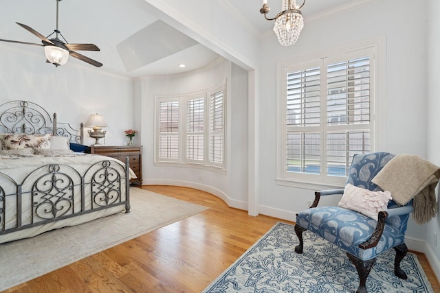 4021 Glenshire St, Houston, TX 77025 - bedroom featuring multiple windows, ornamental molding, wood finished floors, a chandelier, and baseboards
