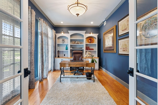 4021 Glenshire St, Houston, TX 77025 - office space featuring ornamental molding, light wood-style floors, and baseboards
