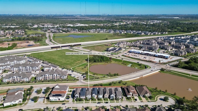 5038 Galahad Ct, Missouri City, TX 77459 - aerial overview of property's location with a large body of water and nearby suburban area