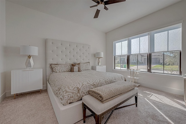 5038 Galahad Ct, Missouri City, TX 77459 - bedroom featuring light colored carpet, baseboards, a ceiling fan, and radiator heating unit