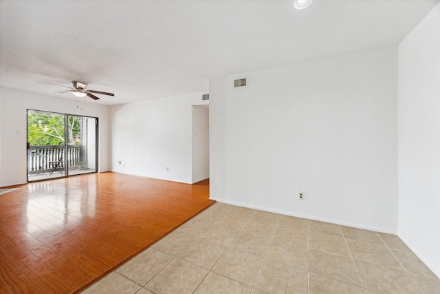 8020 Braesmain Dr Unit 1710, Houston, TX 77025 - spare room with ceiling fan and light tile patterned flooring