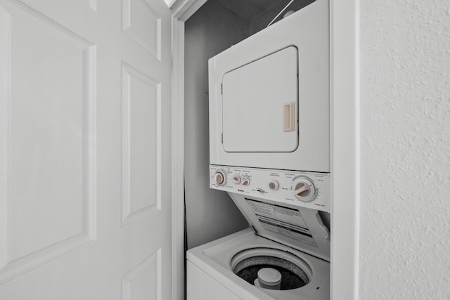8020 Braesmain Dr Unit 1710, Houston, TX 77025 - laundry area featuring stacked washer and clothes dryer