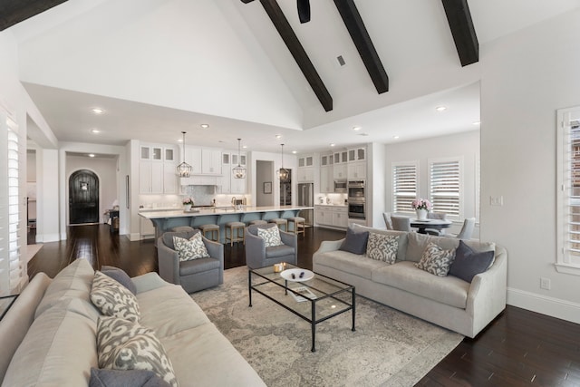 6914 Champion Trl, Katy, TX 77493 - living room featuring baseboards, dark wood-style flooring, high vaulted ceiling, beamed ceiling, and recessed lighting