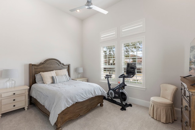 6914 Champion Trl, Katy, TX 77493 - bedroom with light colored carpet, baseboards, and a ceiling fan