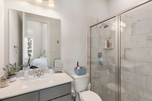 6914 Champion Trl, Katy, TX 77493 - full bath with ensuite bath, a stall shower, vanity, and toilet