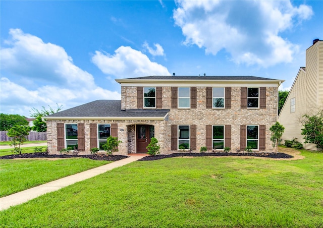 15203 Mcconn St, Houston, TX 77598 - view of front of home featuring a front lawn and brick siding