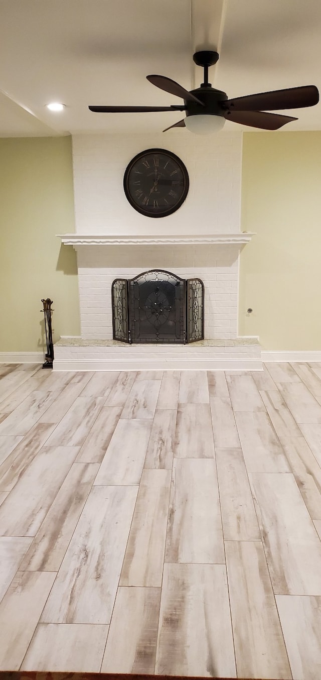 638 Andover St, Spring, TX 77373 - detailed view of a fireplace, ceiling fan, wood finished floors, and recessed lighting