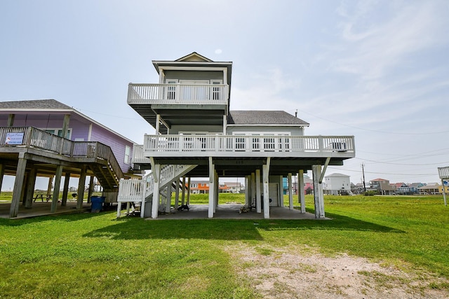 115 Mar Vista Ct, Surfside Beach, TX 77541 - back of house with a carport, stairway, a deck, and a lawn