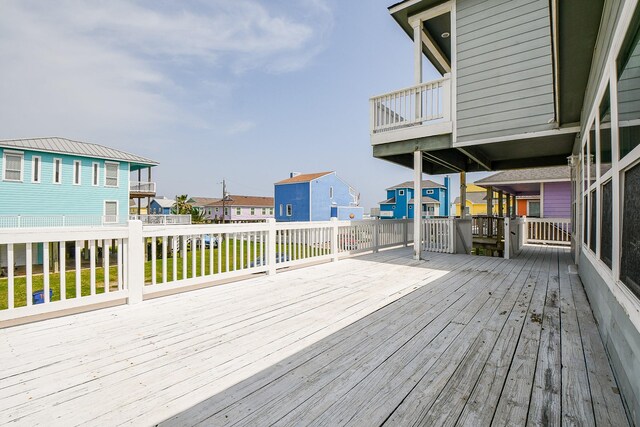 115 Mar Vista Ct, Surfside Beach, TX 77541 - wooden deck featuring a residential view