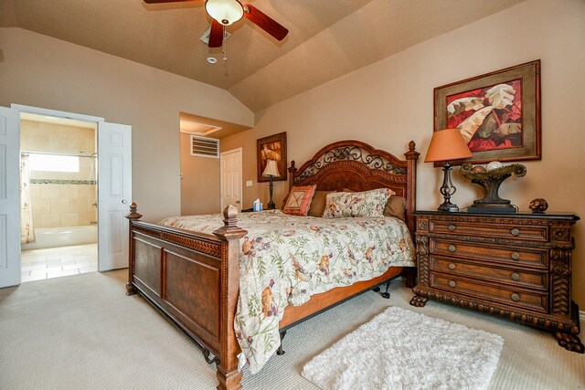 115 Mar Vista Ct, Surfside Beach, TX 77541 - bedroom with light carpet, lofted ceiling, ensuite bathroom, and a ceiling fan