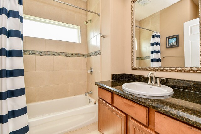 115 Mar Vista Ct, Surfside Beach, TX 77541 - full bathroom featuring shower / tub combo, vanity, and tile patterned flooring