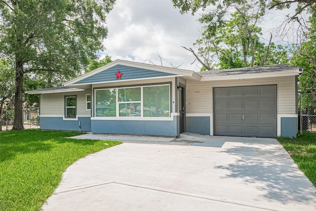 6058 Lyndhurst Dr, Houston, TX 77033 - view of front of property with a garage and concrete driveway