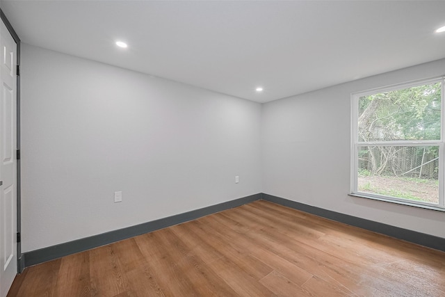 6058 Lyndhurst Dr, Houston, TX 77033 - empty room featuring wood finished floors, recessed lighting, and baseboards