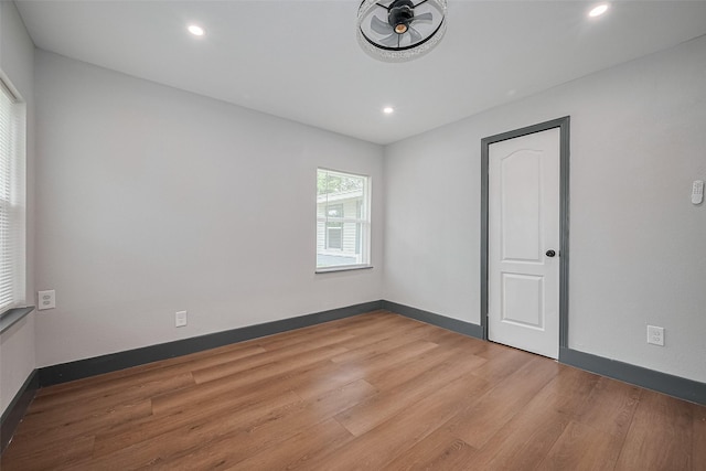 6058 Lyndhurst Dr, Houston, TX 77033 - empty room with wood finished floors, recessed lighting, baseboards, and a ceiling fan