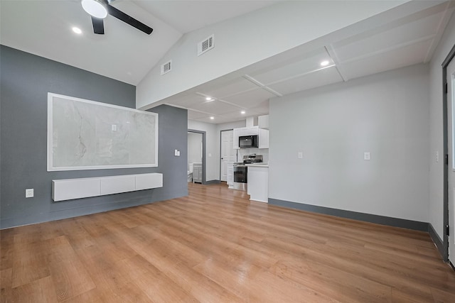 6058 Lyndhurst Dr, Houston, TX 77033 - unfurnished living room with light wood-type flooring, a ceiling fan, vaulted ceiling, recessed lighting, and baseboards