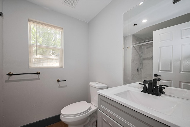 6058 Lyndhurst Dr, Houston, TX 77033 - bathroom with toilet, vanity, and a shower