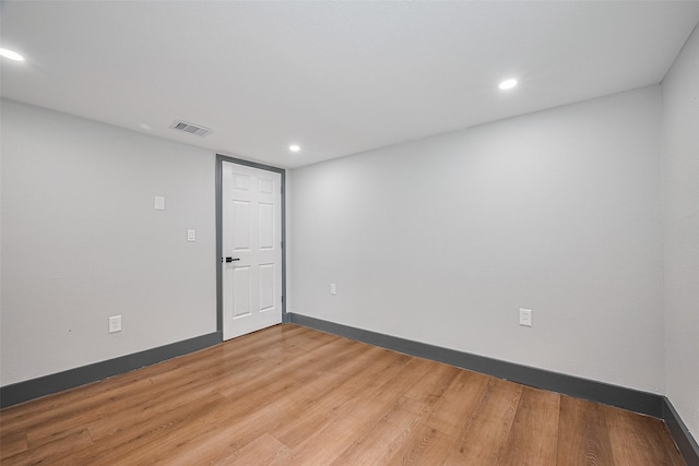 6058 Lyndhurst Dr, Houston, TX 77033 - unfurnished room with light wood-type flooring, recessed lighting, and baseboards