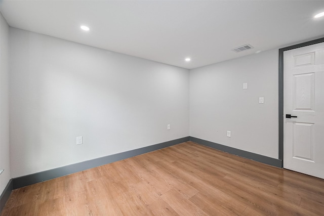 6058 Lyndhurst Dr, Houston, TX 77033 - spare room with light wood finished floors, baseboards, and recessed lighting