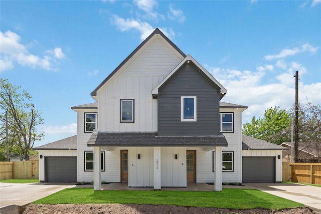 222 Canino Rd A/B, Unit A/B Houston, TX 77076 - modern farmhouse featuring board and batten siding, roof with shingles, covered porch, driveway, and an attached garage